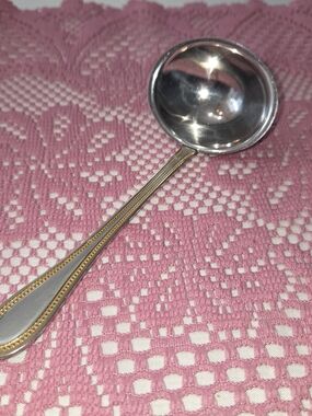 Stainless Steel & Gold Accent Serving Ladle. CP